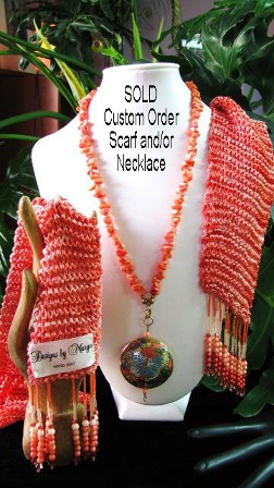 Designs By Marge handknitted, handbeaded scarf with swarovski crystals...peach and coral cloissonne' pendant